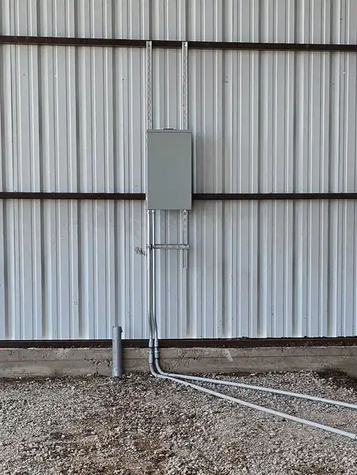 Panel set on the building wall with the underground feeders landed.