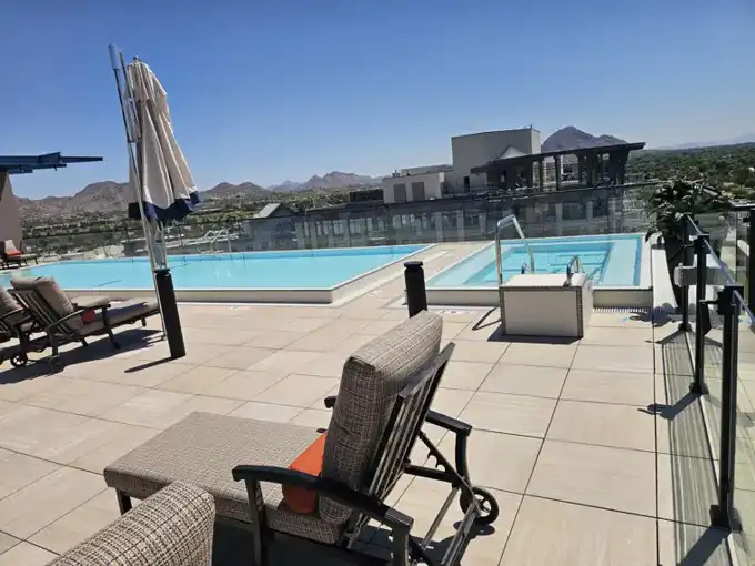 Pool and spa from the deck side, looking toward Camelback Mountain.