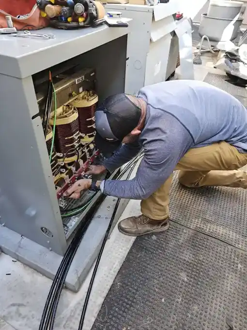 Terminating the 480V dry-type transformer on the roof.
